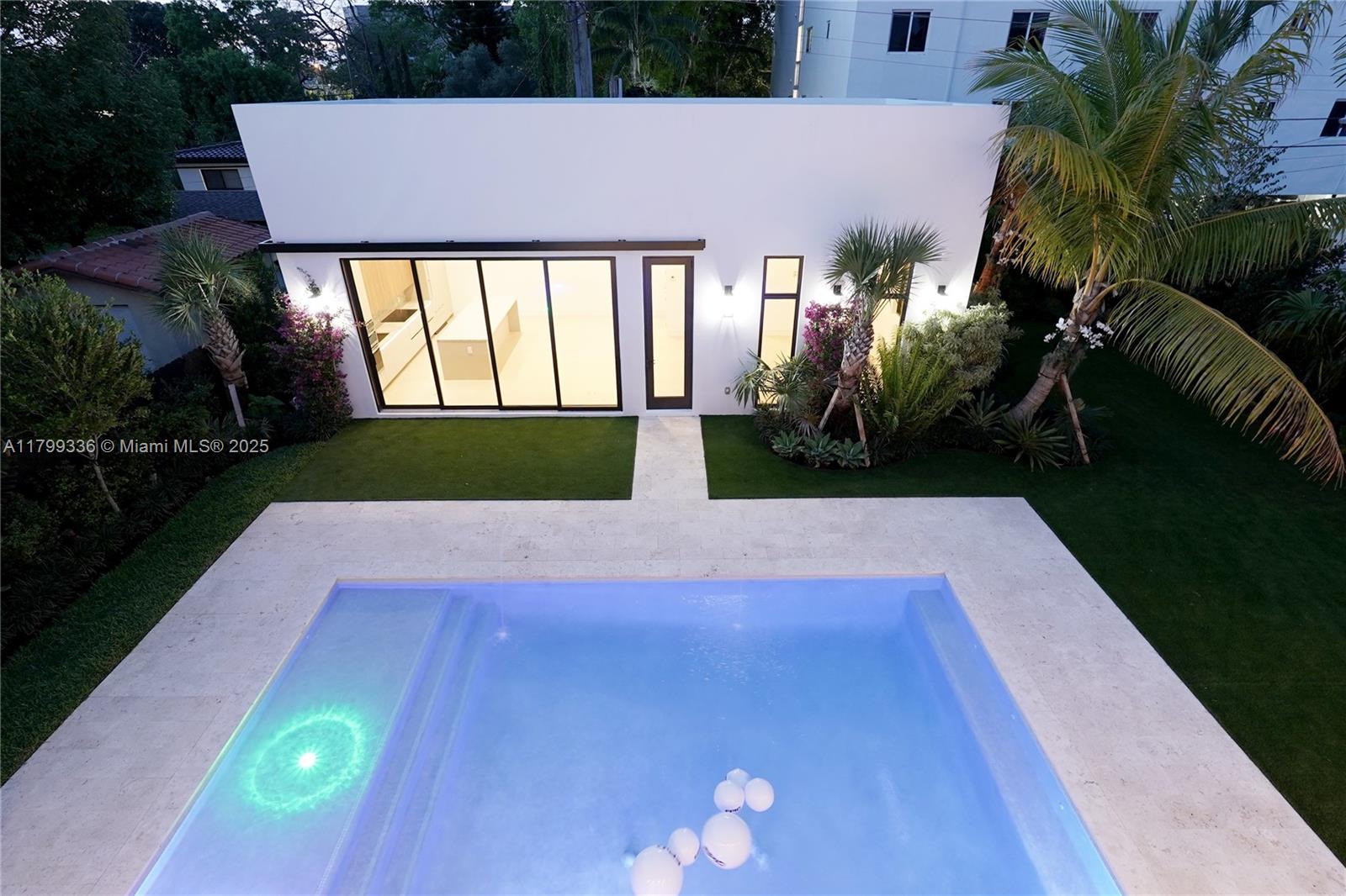 4231 Southwest 10th Street Miami, FL 33134 - Photo 21 of 35 a front view of a house with garden