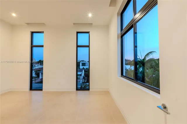 a view of an entryway with a room