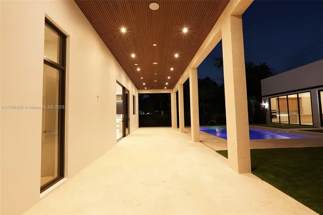 a picture of a building with large windows