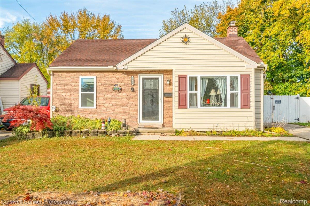 3582 Swanson Street Wayne, MI 48184 - Photo 2 of 30 Bungalow-style house with a chimney, a shingled roof, and a gate