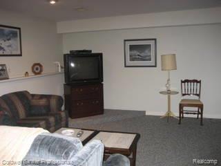 9043 East Lake Road, Unit 46 Clarkston, MI 48348 - Photo 8 of 11 Lower Level Family Room
