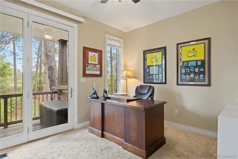 a utility room with cabinets washer and dryer