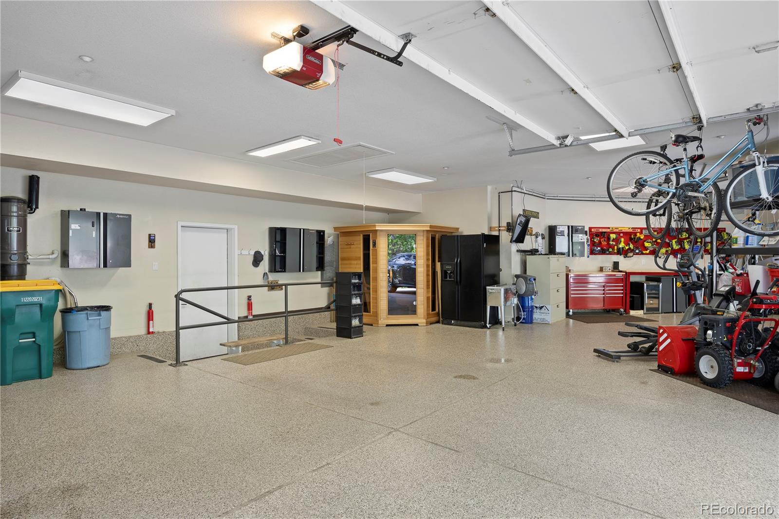 315 Prospect Drive Castle Rock, CO 80108 - Photo 24 of 45 a view of a garage with rack and bicycle