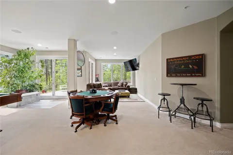 a view of a chairs and table in the patio