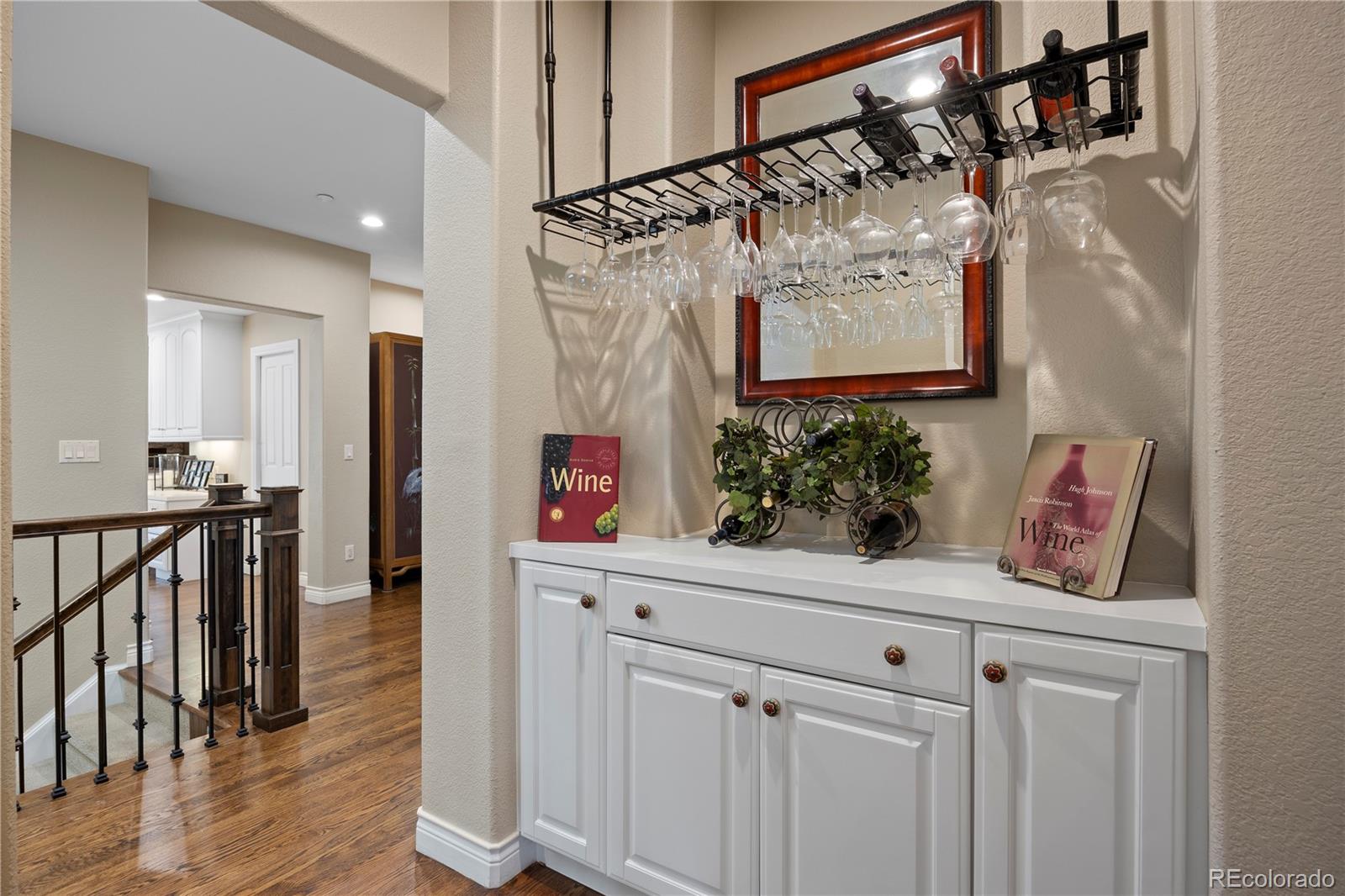 315 Prospect Drive Castle Rock, CO 80108 - Photo 9 of 45 a view of a hallway and wooden floor