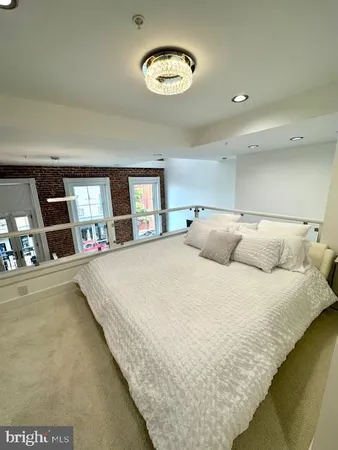 a kitchen with a sink and a refrigerator