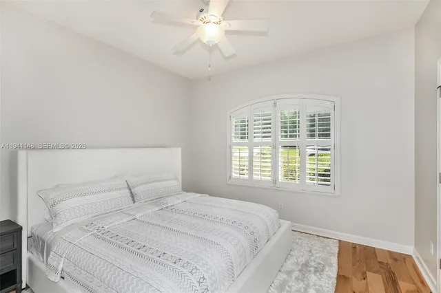 a view of a house with a backyard porch and sitting area