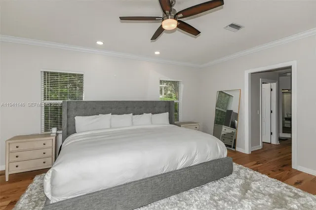 a bathroom with a bathtub and a sink