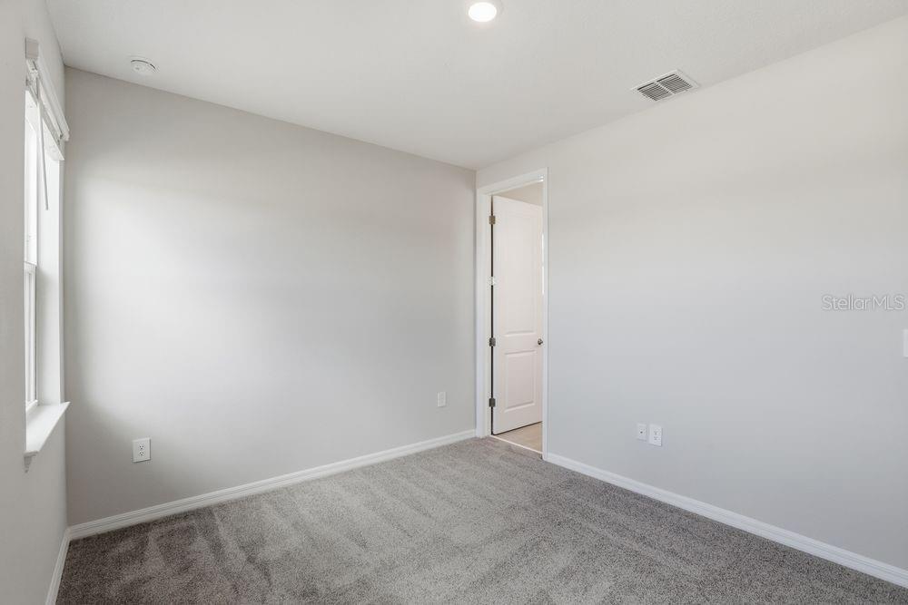 1014 Top Minnow Road St. Cloud, FL 34771 - Photo 16 of 39 a view of an empty room