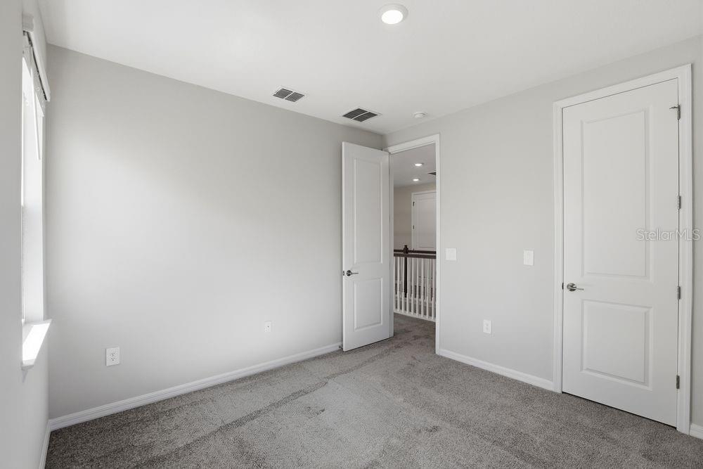 1014 Top Minnow Road St. Cloud, FL 34771 - Photo 18 of 39 a view of an empty room