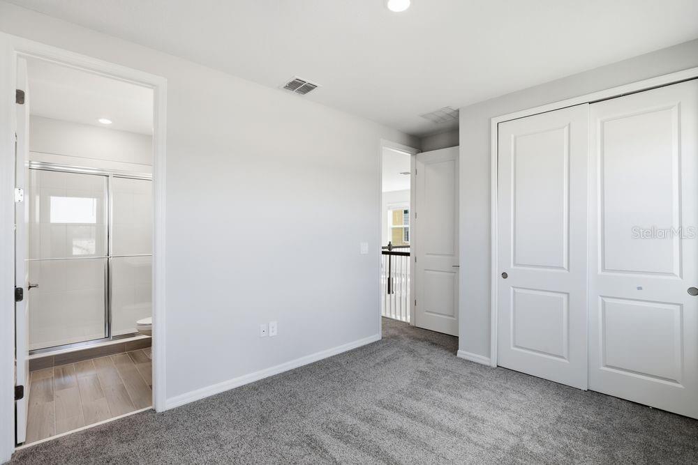 1014 Top Minnow Road St. Cloud, FL 34771 - Photo 19 of 39 an empty room with closet area