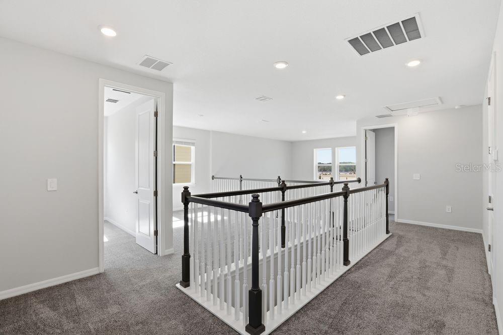 1014 Top Minnow Road St. Cloud, FL 34771 - Photo 27 of 39 a view of a hallway with a hallway