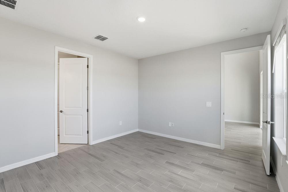 1014 Top Minnow Road St. Cloud, FL 34771 - Photo 10 of 39 a view of an empty room