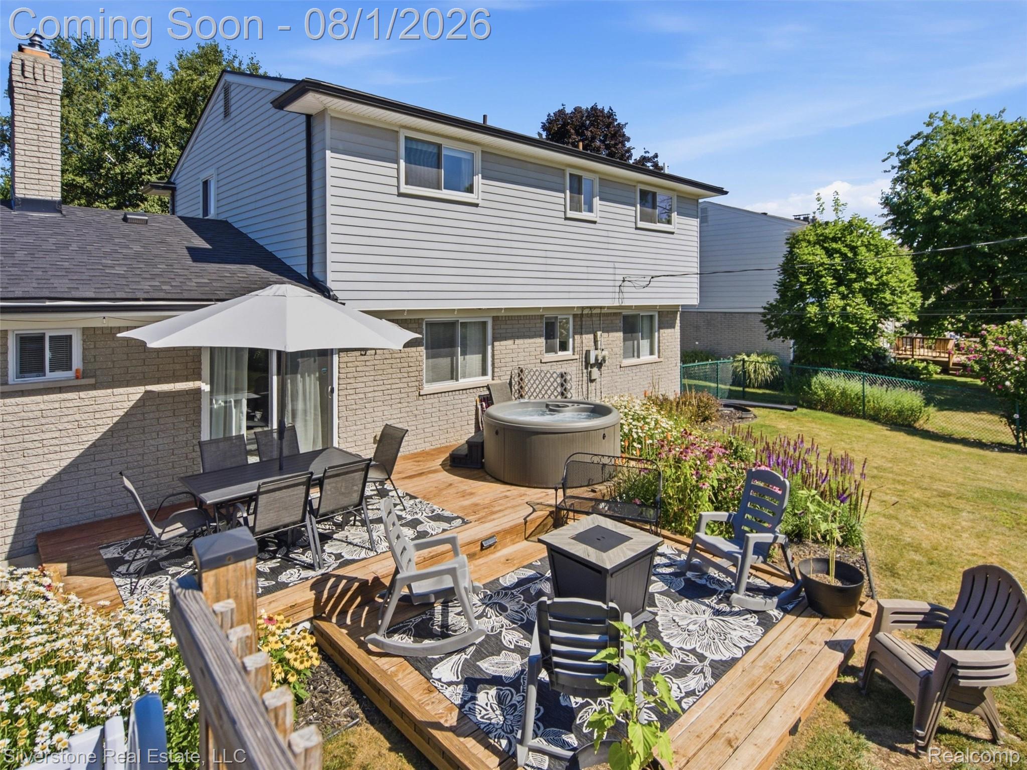 2135 Wayward Drive Rochester, MI 48309 - Photo 50 of 55 Multi-level wood deck featuring a built-in hot tub