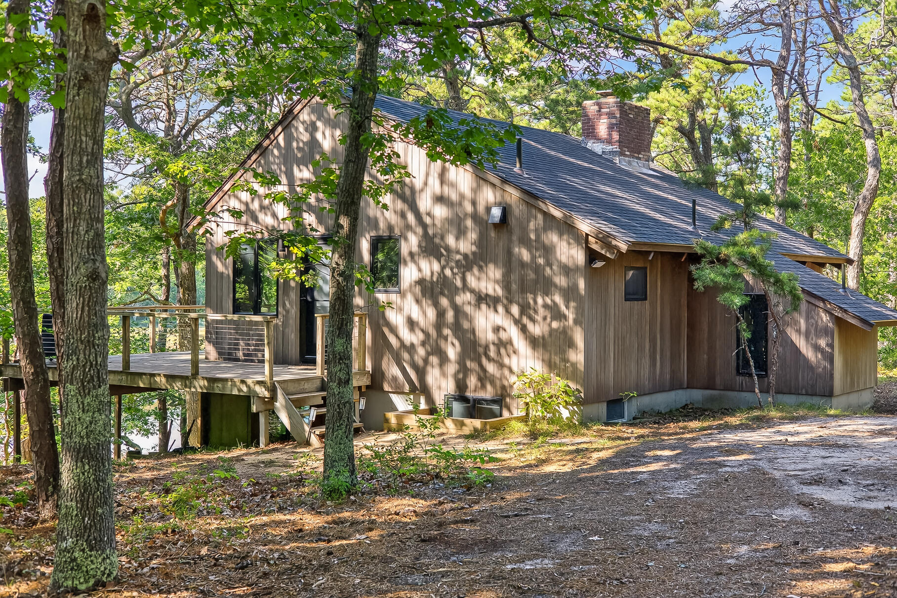 90 Blue Heron Road Wellfleet, MA 02667 - Photo 1 of 54 a view of a house with a yard