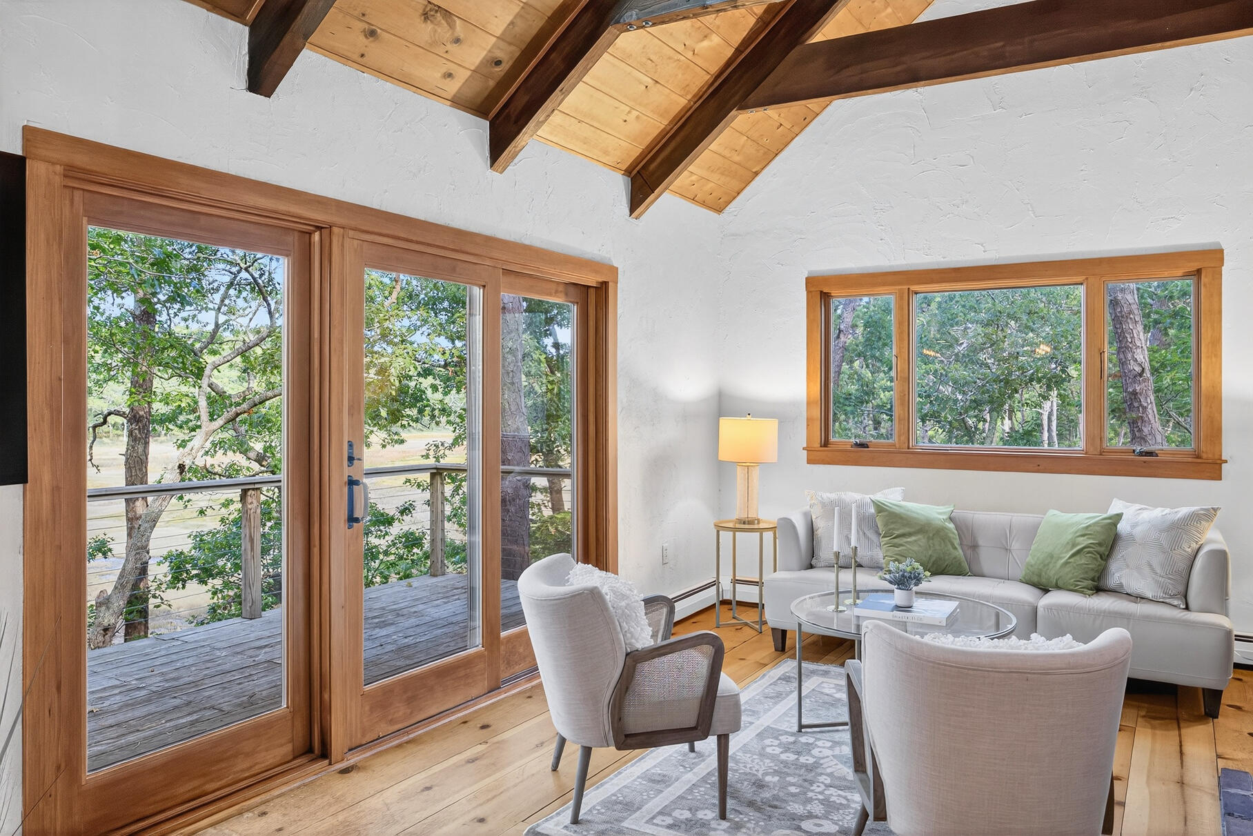 90 Blue Heron Road Wellfleet, MA 02667 - Photo 16 of 54 a living room with furniture and a large window