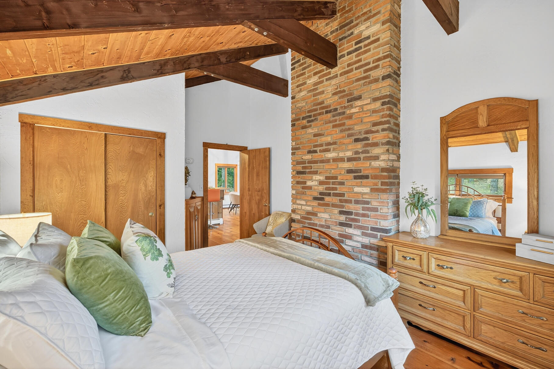 90 Blue Heron Road Wellfleet, MA 02667 - Photo 21 of 54 a bedroom with a bed and large windows