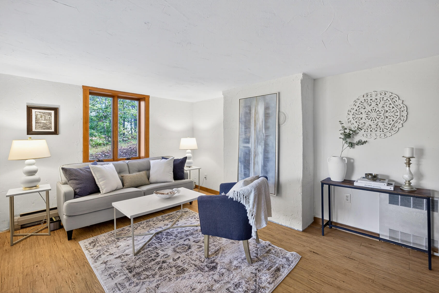 90 Blue Heron Road Wellfleet, MA 02667 - Photo 31 of 54 a living room with furniture rug and window