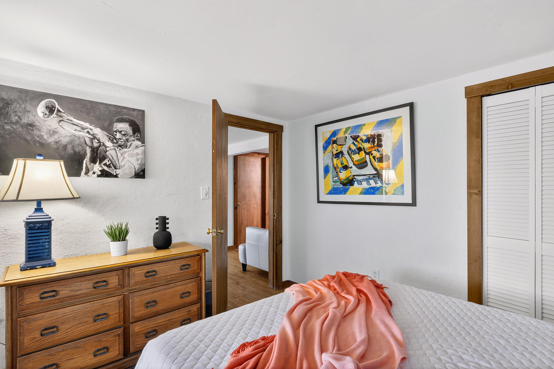 90 Blue Heron Road Wellfleet, MA 02667 - Photo 34 of 54 a bedroom with a bed and a lamp on dresser