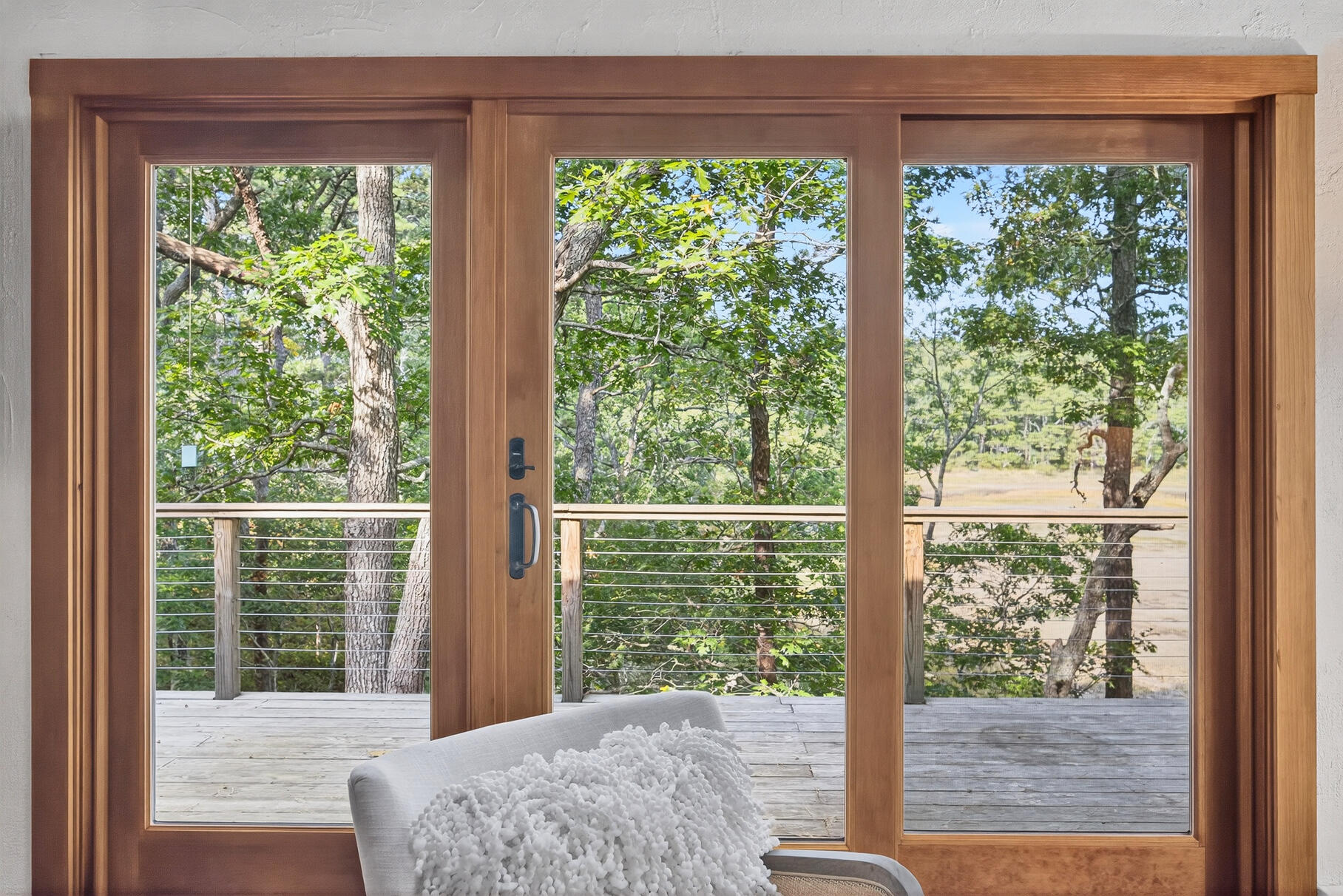 90 Blue Heron Road Wellfleet, MA 02667 - Photo 40 of 54 a view of a large window with a balcony