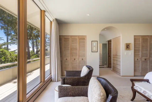 a spacious bathroom with sink bathtub and next to a window