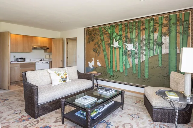 a living room with a couch and a table