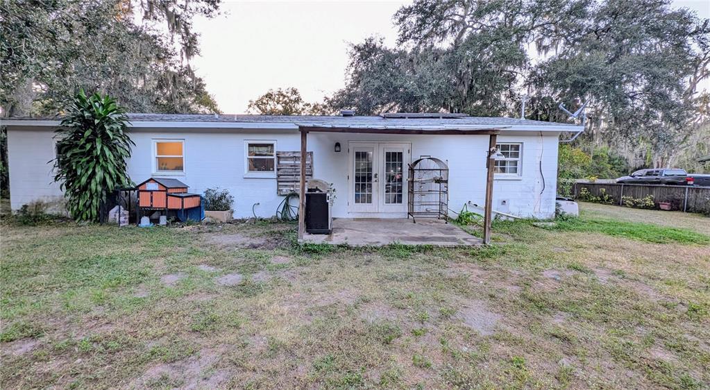 2024 East Keysville Road Lithia, FL 33547 - Photo 29 of 37 a view of a house with a yard