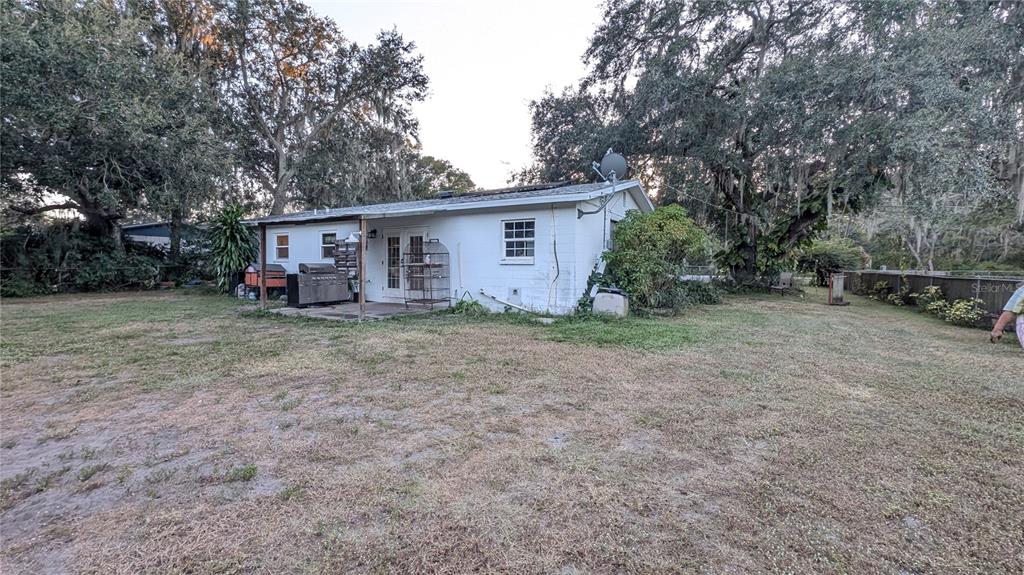 2024 East Keysville Road Lithia, FL 33547 - Photo 30 of 37 a view of a house with a backyard
