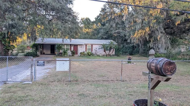 a view of a yard and patio