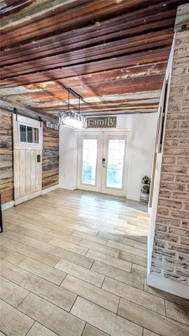 a bathroom with a sink a mirror and a shower