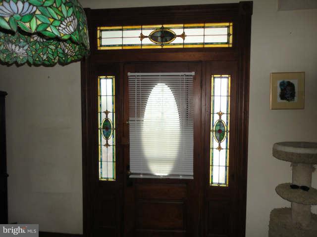 7520 Philadelphia Road Rosedale, MD 21237 - Photo 11 of 27 Stained glass front entrance