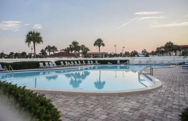 a view of a swimming pool with a lake view