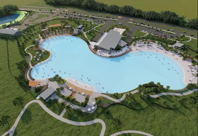 an aerial view of a house with outdoor space