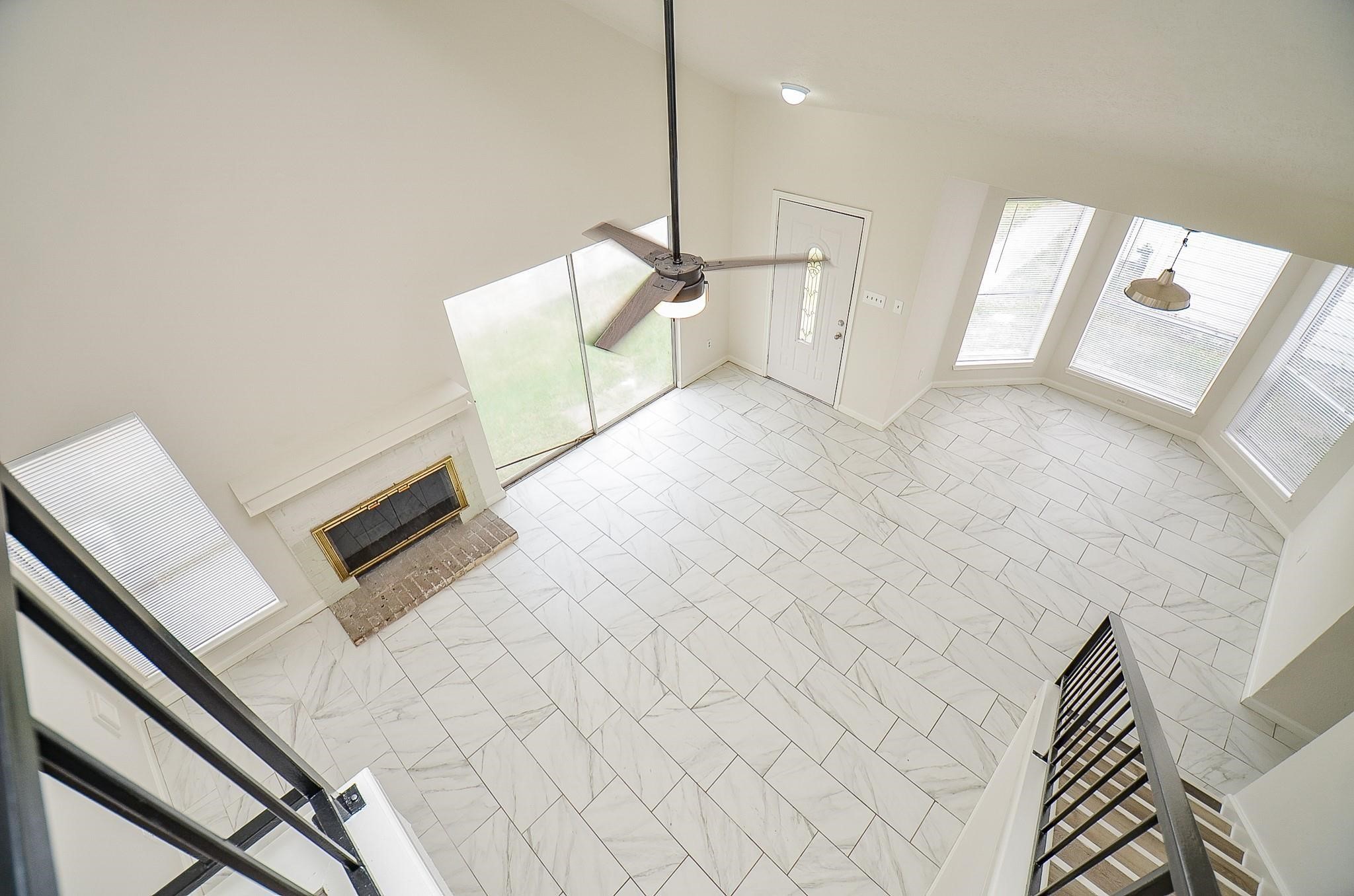 11818 Spring Grove Drive Houston, TX 77099 - Photo 13 of 18 a view of an empty room and wooden floor