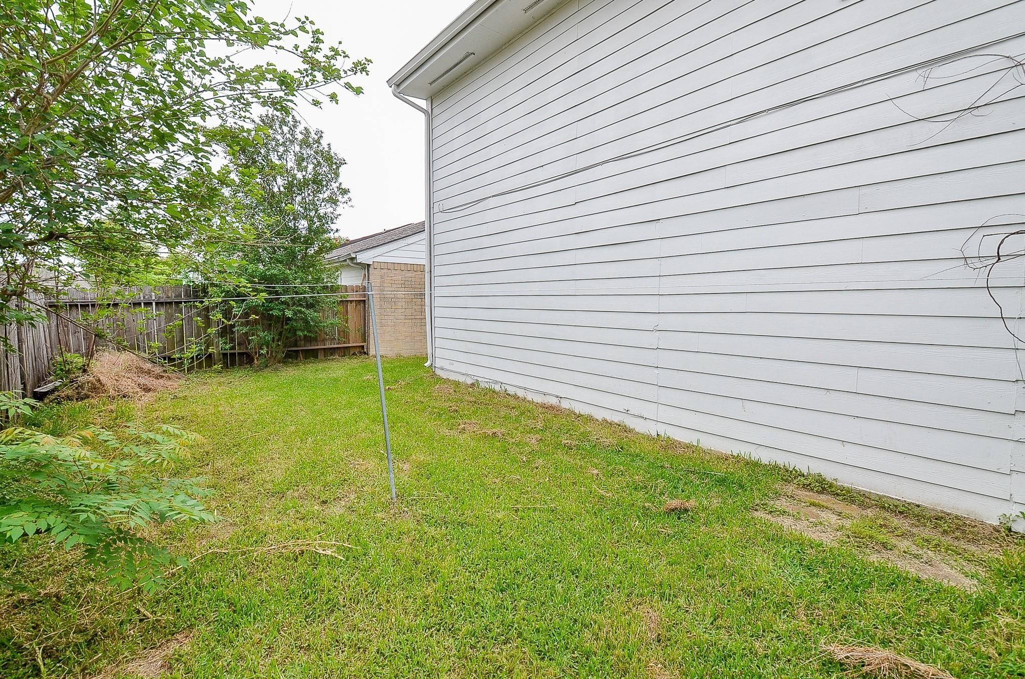 11818 Spring Grove Drive Houston, TX 77099 - Photo 18 of 18 a view of a backyard