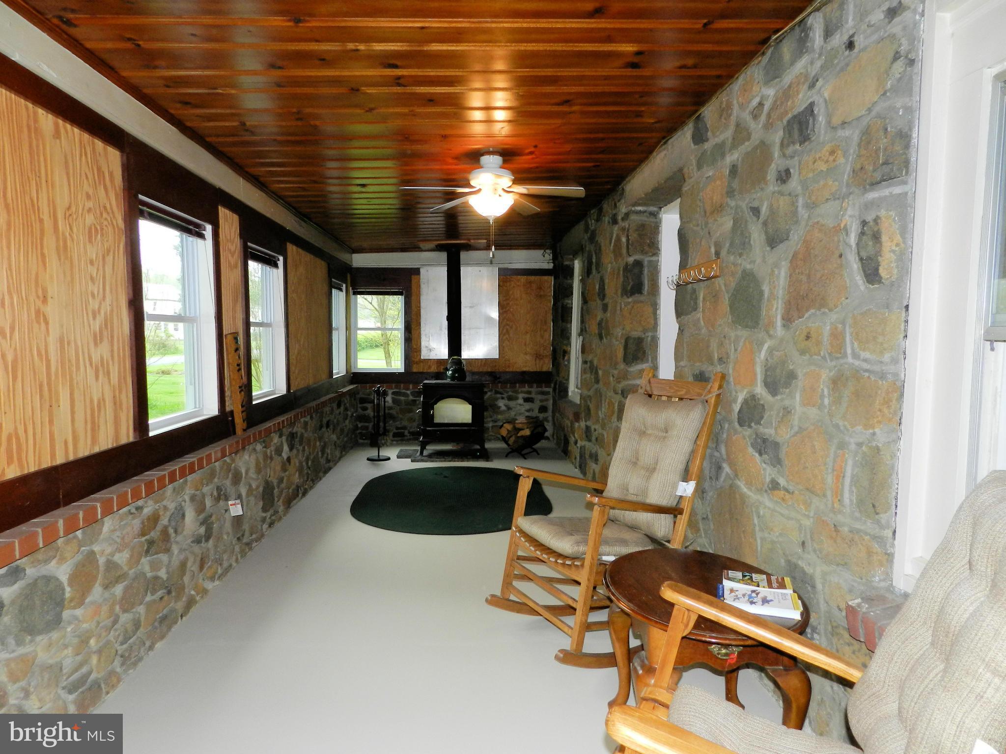 3325 Forge Hill Road Street, MD 21154 - Photo 21 of 30 Front Enclosed Porch with Wood Stove