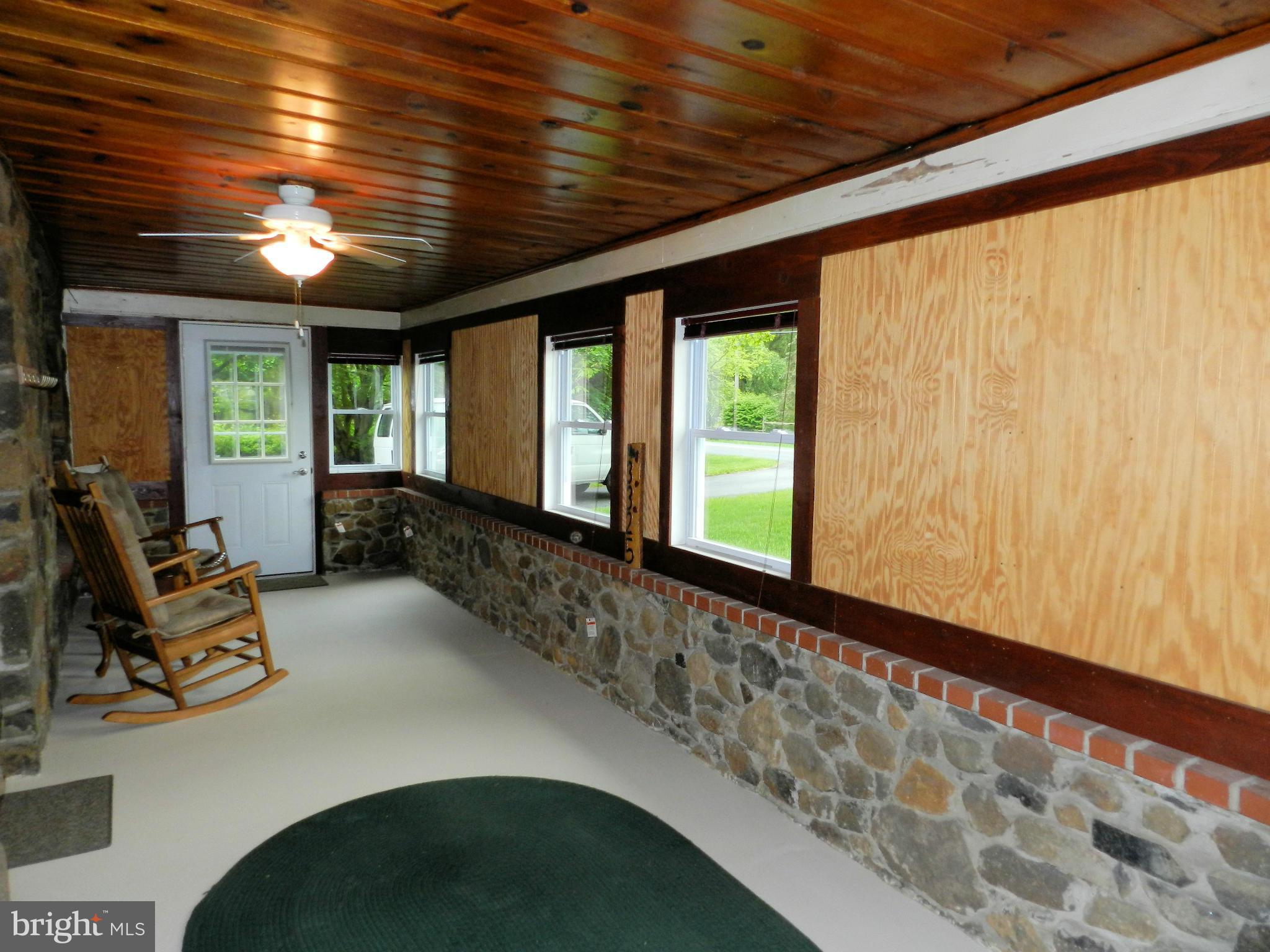 3325 Forge Hill Road Street, MD 21154 - Photo 22 of 30 Front Enclosed Porch with Wood Stove