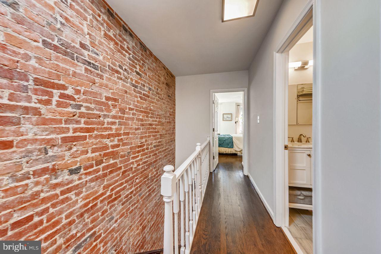650 Acker Place Northeast Washington, DC 20002 - Photo 17 of 37 Exposed brick in upper level hall