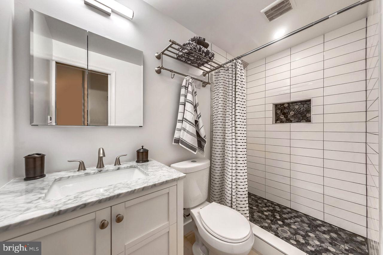 650 Acker Place Northeast Washington, DC 20002 - Photo 35 of 37 3rd full bath finishes off the basement