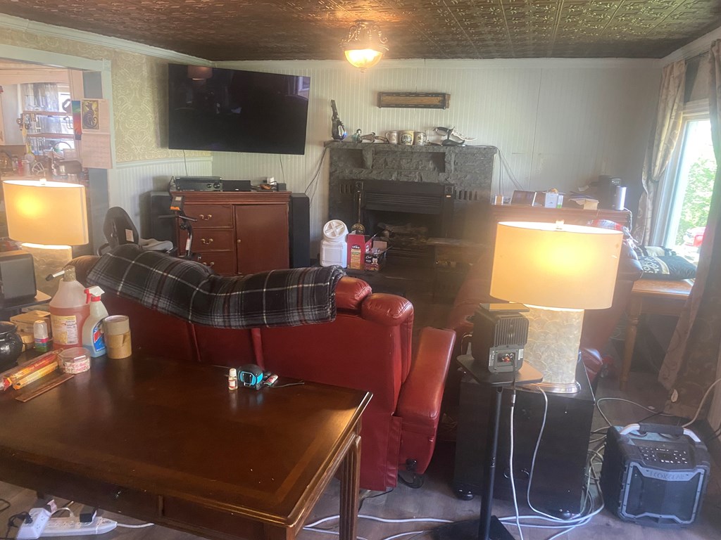 1760 Jordan Hollow Road Parker, PA 16049 - Photo 11 of 52 a living room with furniture and a flat screen tv
