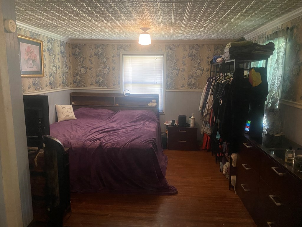 1760 Jordan Hollow Road Parker, PA 16049 - Photo 18 of 52 a bed sitting in a room next to a window