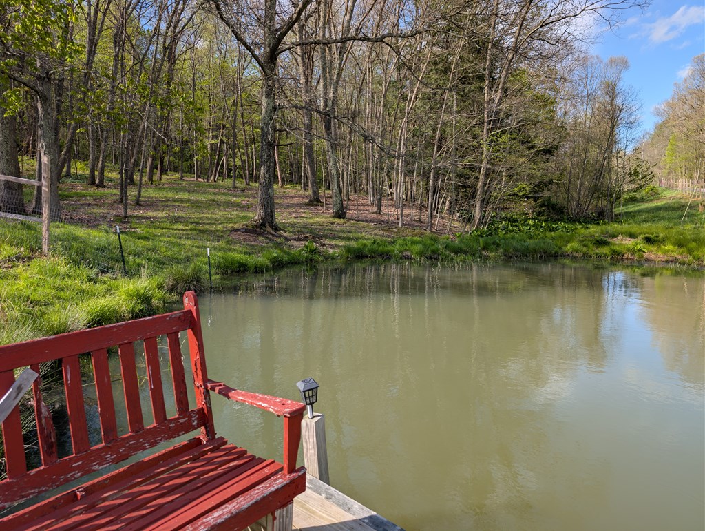 1760 Jordan Hollow Road Parker, PA 16049 - Photo 34 of 52 a view of a wooden deck with lake
