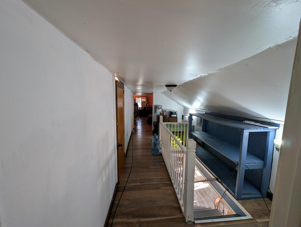 1760 Jordan Hollow Road Parker, PA 16049 - Photo 50 of 52 a hallway with a white walls and stairs