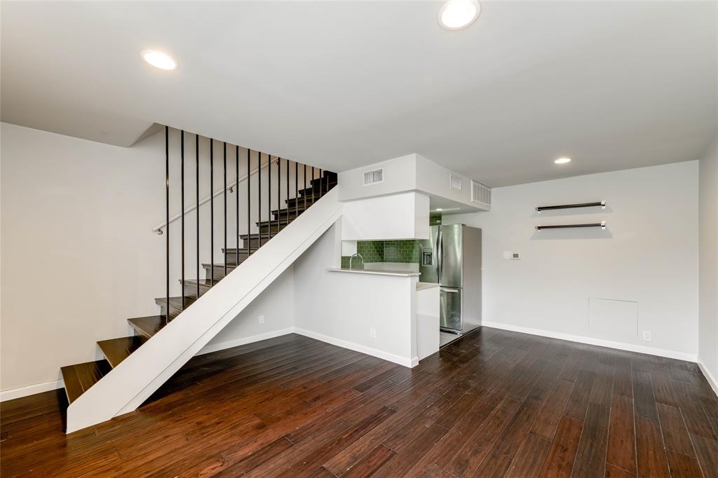 3110 Red River Street, Unit 220 Austin, TX 78705 - Photo 2 of 8 a view of entryway and hall with wooden floor