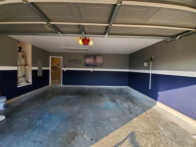 a view of a room with a flat screen tv