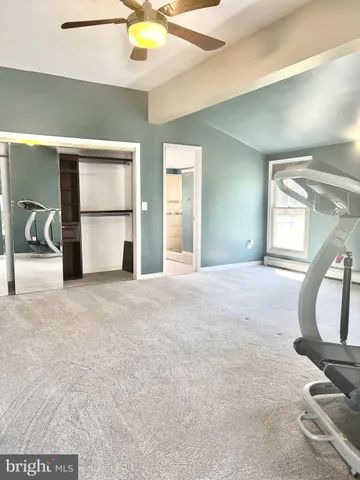 a view of a livingroom with natural light