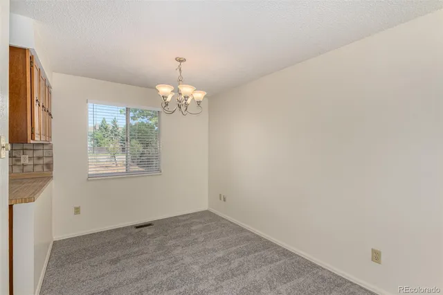 a view of an empty room with window