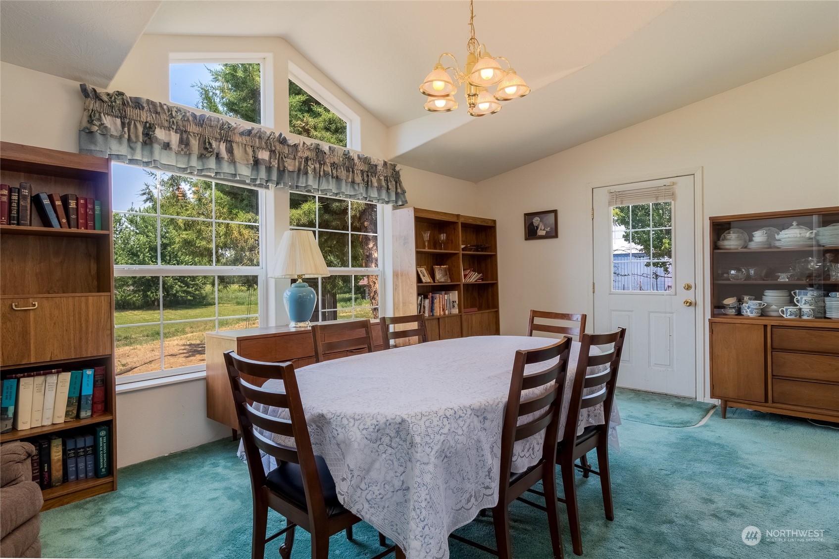 1444 Stovall Road Walla Walla, WA 99362 - Photo 12 of 27 a view of a dining room with furniture window and wooden floor