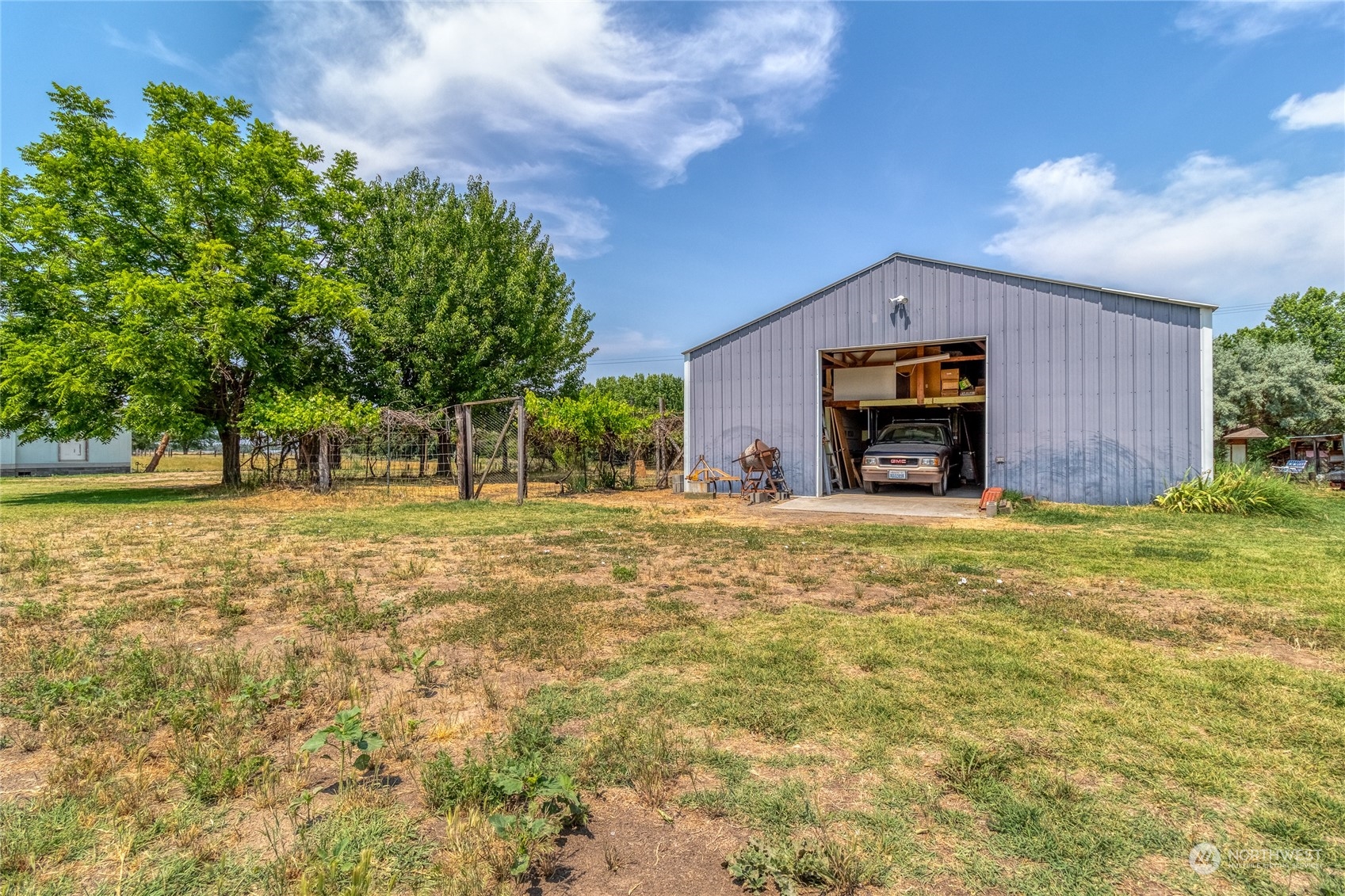 1444 Stovall Road Walla Walla, WA 99362 - Photo 4 of 27 a view of a house with a yard