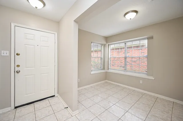 a view of an empty room with window